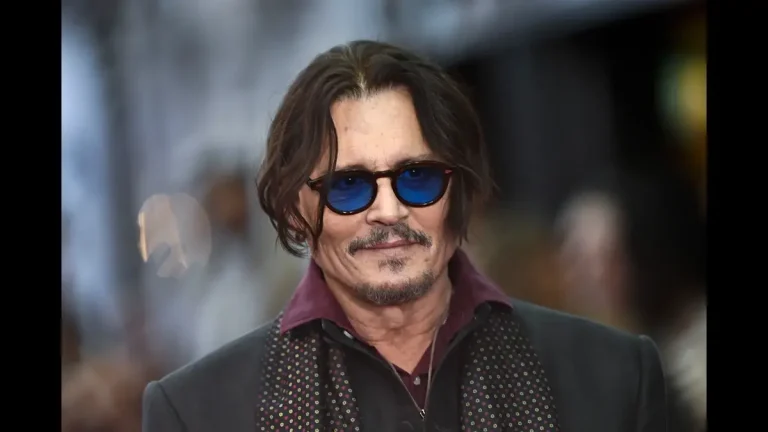 Johnny Depp as Scrooge in Ebenezer A Christmas Carol with heavy prosthetics and dark transformation